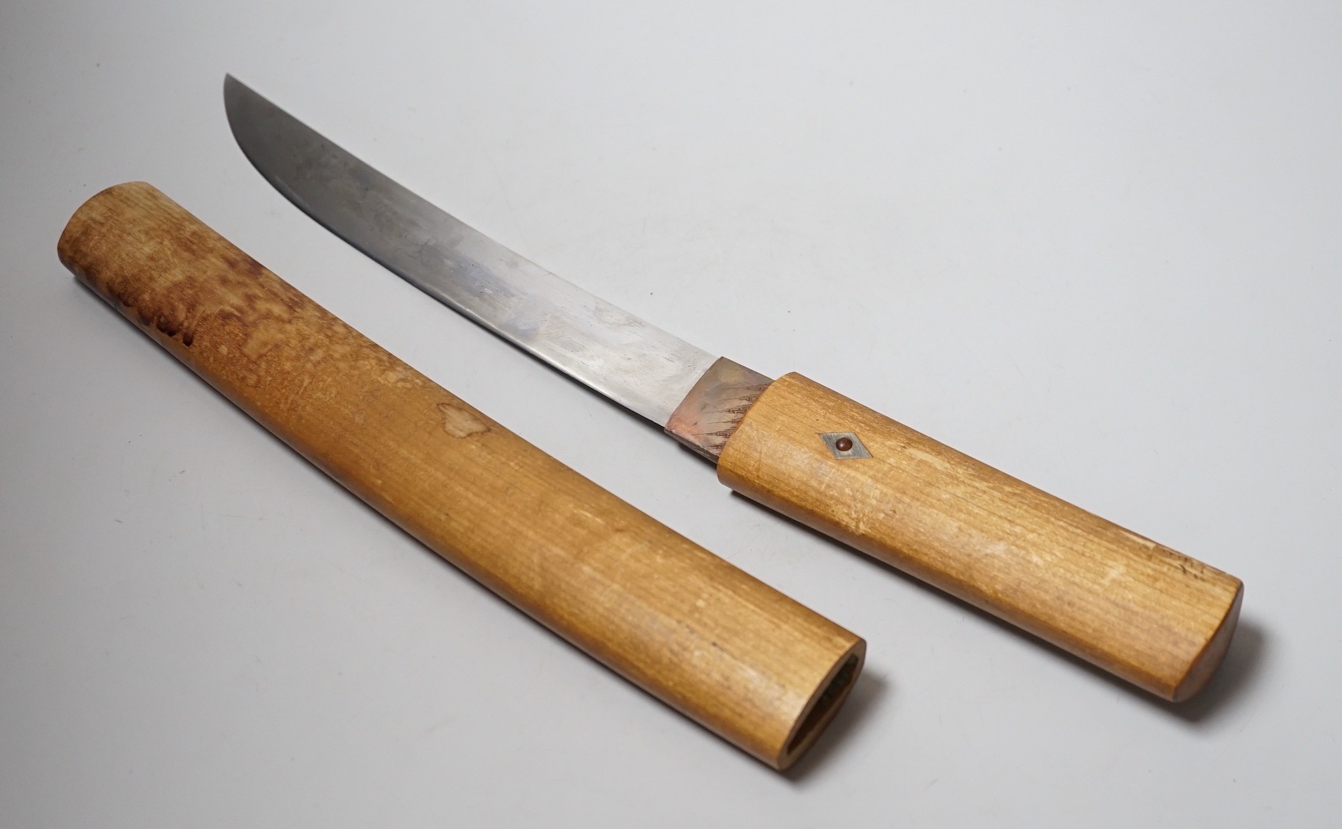 A Japanese Yoroi-doshi (armour piercer) type tanto with horn inlaid wood handle. 47cm total length including saya